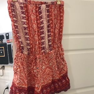 Cute romper with a cute tassel in the front